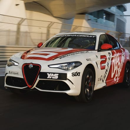 Yas Marina Circuit Passenger Ride – Alfa Romeo Guilia Quadrifoglio – Experiences OHHE.com Special Offers, Deals & Discounts